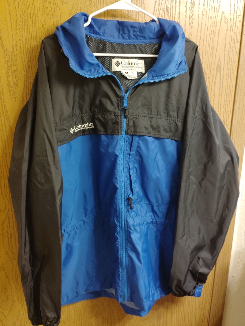 Columbia Black Jacket with Blue Zipper Trim